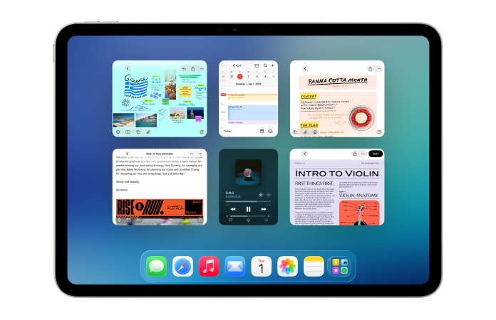 iPad, orientace na ?í?ku, na obrazovce je ?est oken ve dvou ?adách v?etně Kalendá?e, Poznámek, Hudby a Safari
