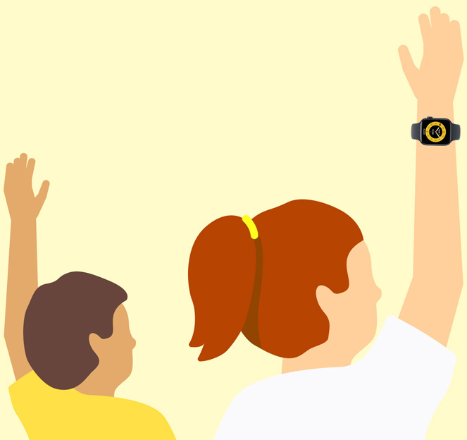Unos ni?os levantan la mano en un aula con el Apple Watch en la mu?eca.