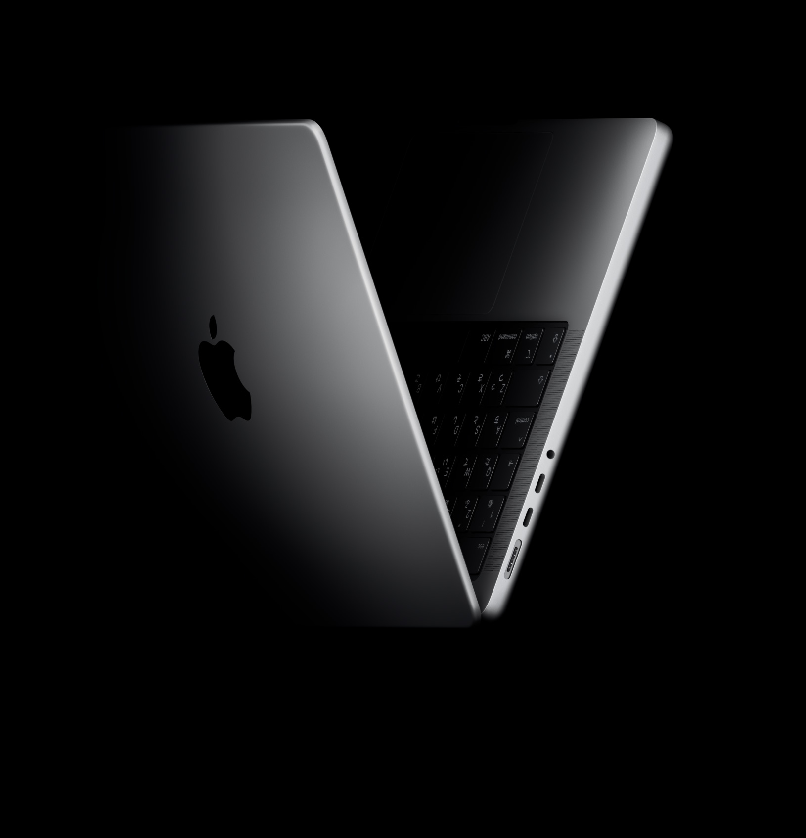 V字に見(jiàn)えるように置かれたMacBook Pro。M5チップを表現(xiàn)している