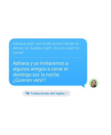 La funcionalidad Traducción en Vivo en Mensajes en uso muestra una traducción de inglés a espa?ol