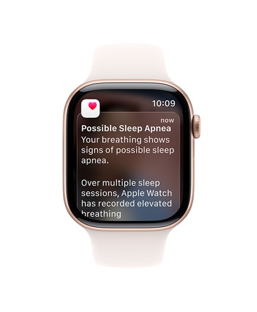 Apple Watch Series 11 z kopert? z aluminium w kolorze ró?owego z?ota, pasek sportowy w kolorze ?agodnego ró?u, rozwini?te powiadomienie o bezdechu sennym, prawy bok urz?dzenia, pokr?t?o Digital Crown