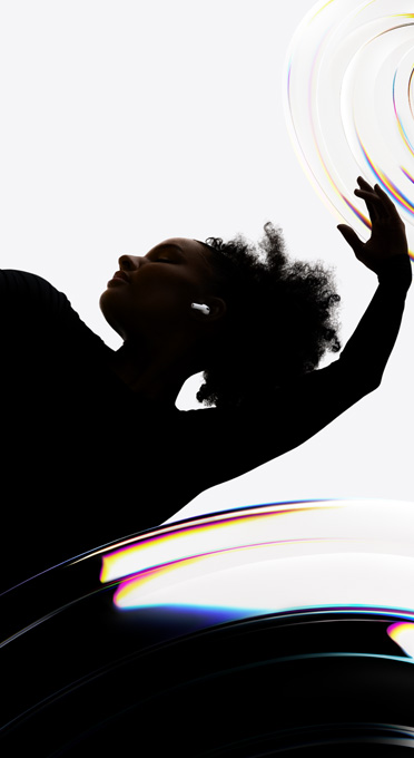 AirPods?Pro 3 inserted in the ear of a dancer as they enjoy a hands-free listening experience